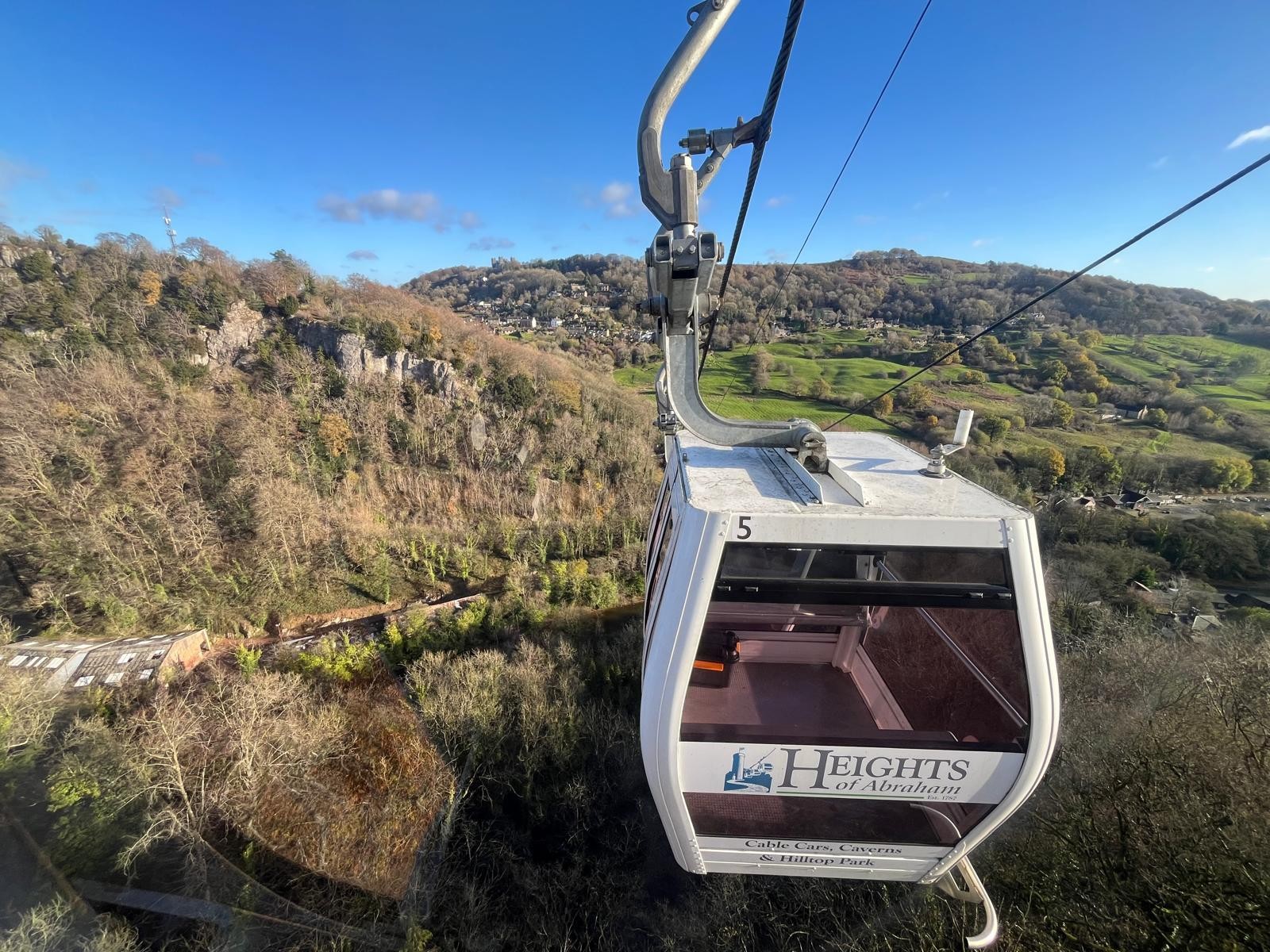 cable car with hills in background